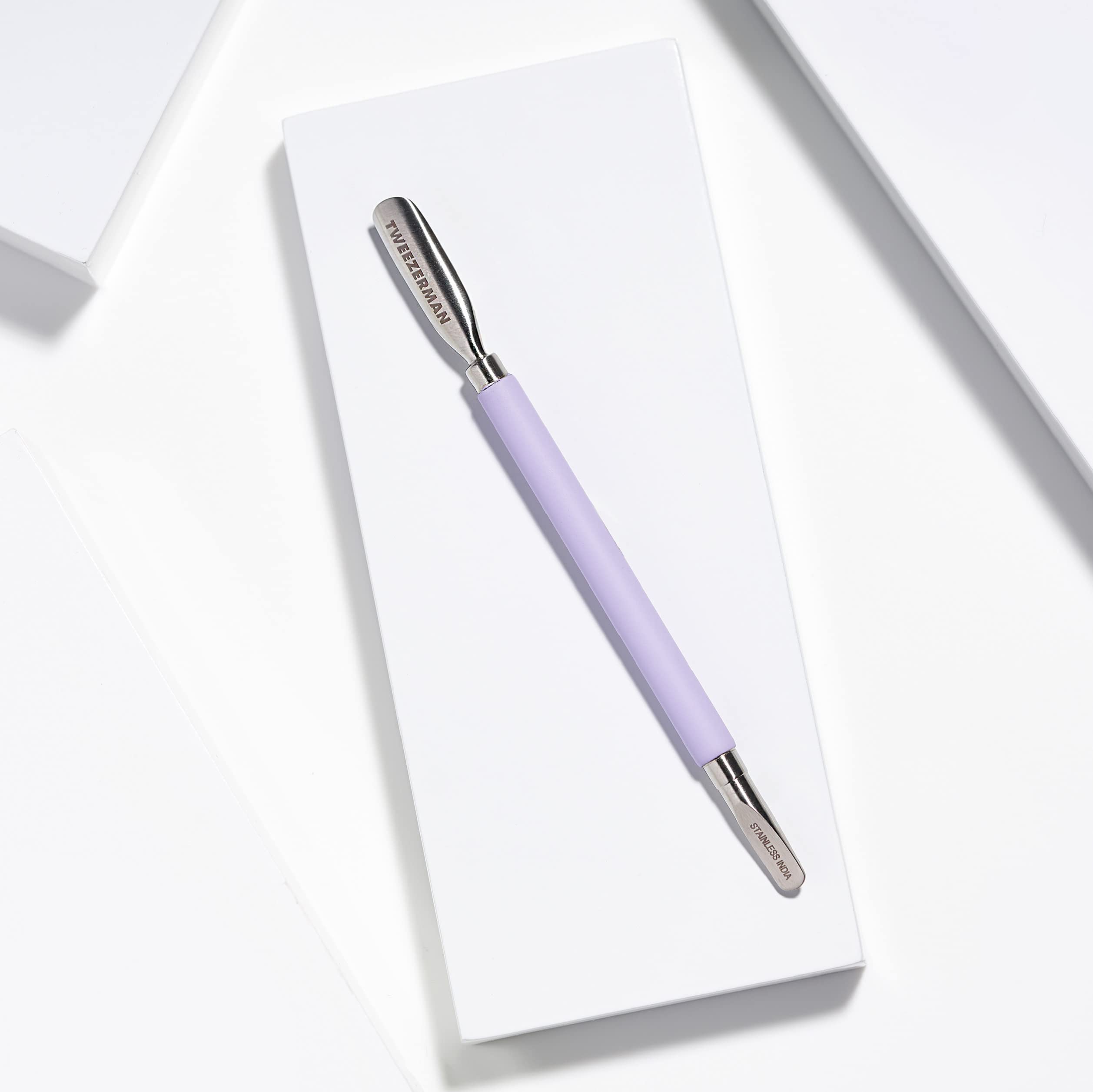 Tweezerman Dual Sided Pushy stainless steel design ensures durability and easy sanitization.