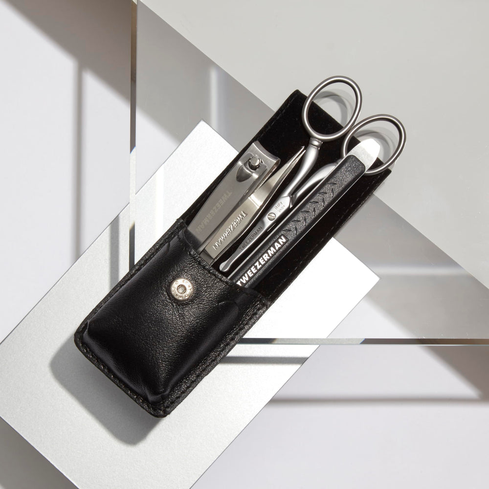 Tweezerman Essential Grooming Kit kit-assembled displays complete on-the-go grooming set.