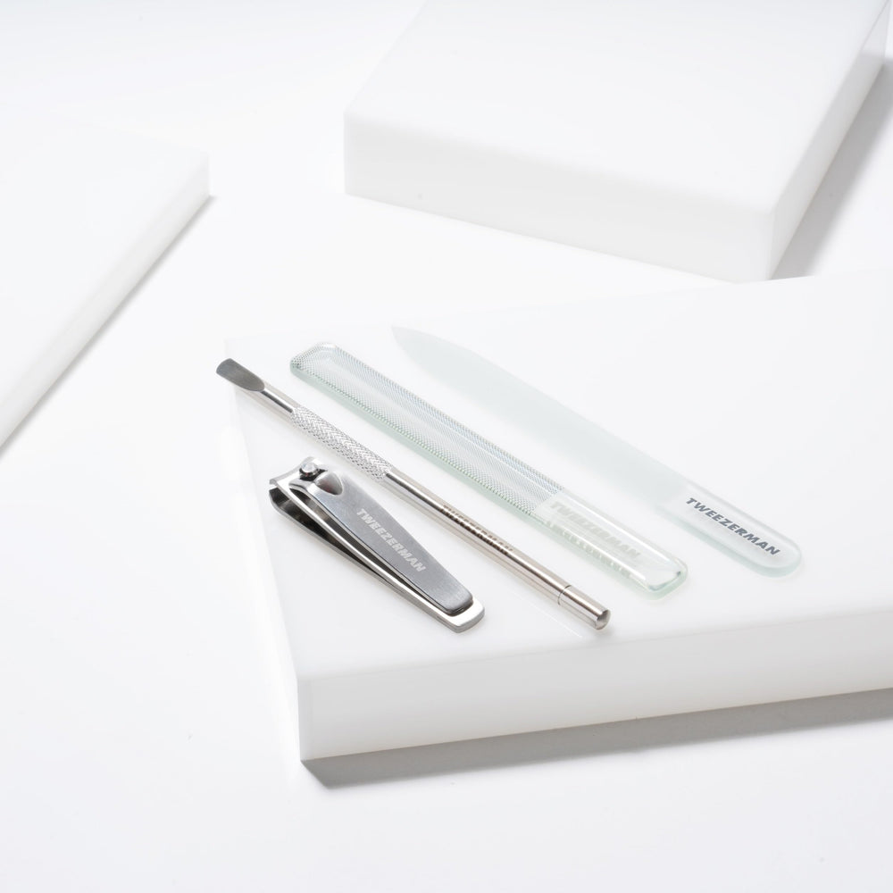 Tweezerman Glass Manicure Set stainless-steel blades provide precise trimming and durable performance.