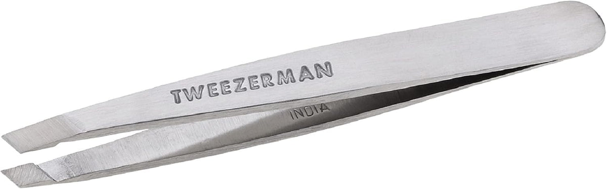 Tweezerman Mini Slant Tweezer closeup of precision tips for reliable hair removal.