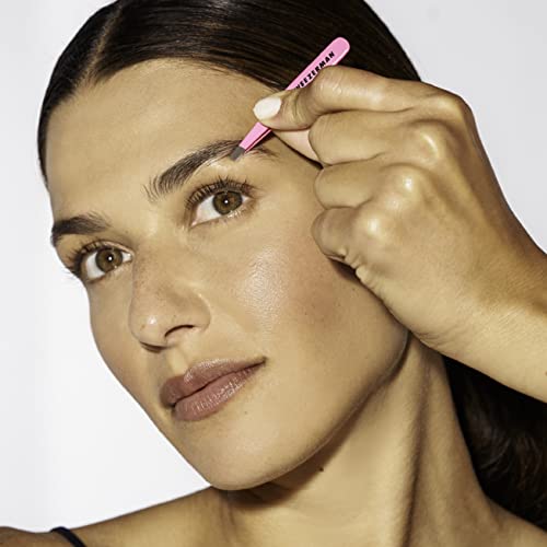 Tweezerman Mini Slant Tweezer in-hand use shows control and comfort