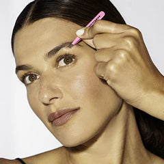 Tweezerman Mini Slant Tweezer in-hand use shows control and comfort