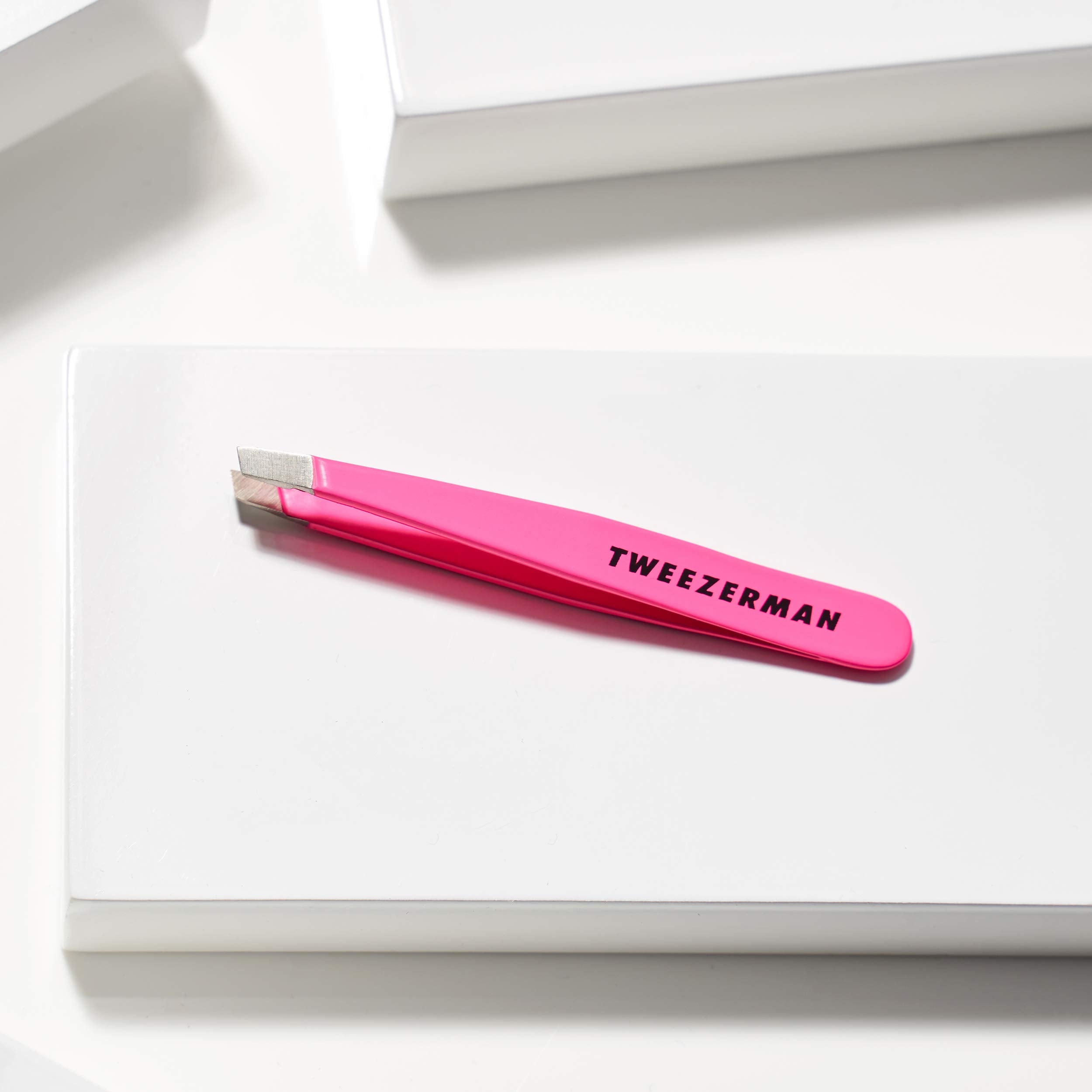 Tweezerman Mini Slant Tweezer removing ingrown hairs with accuracy