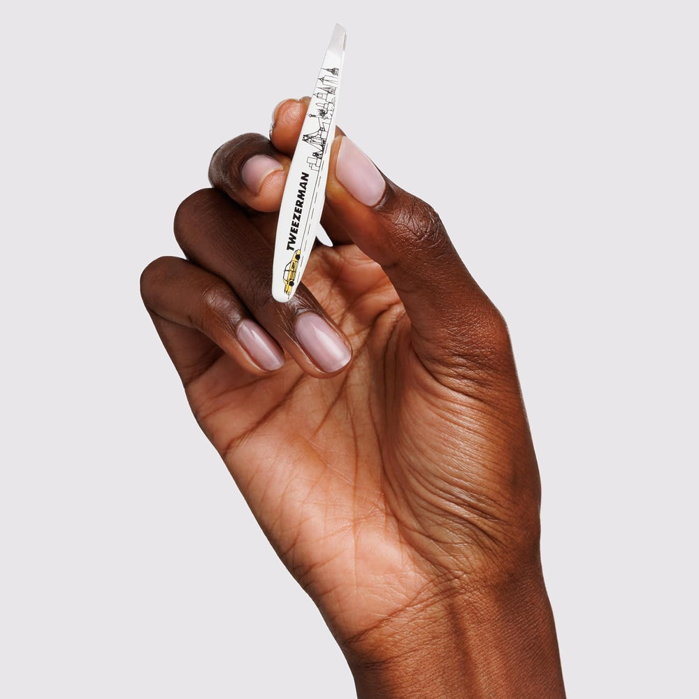 Tweezerman NYC Mini Slant Tweezer aligned tips ensure clean, confident hair removal.