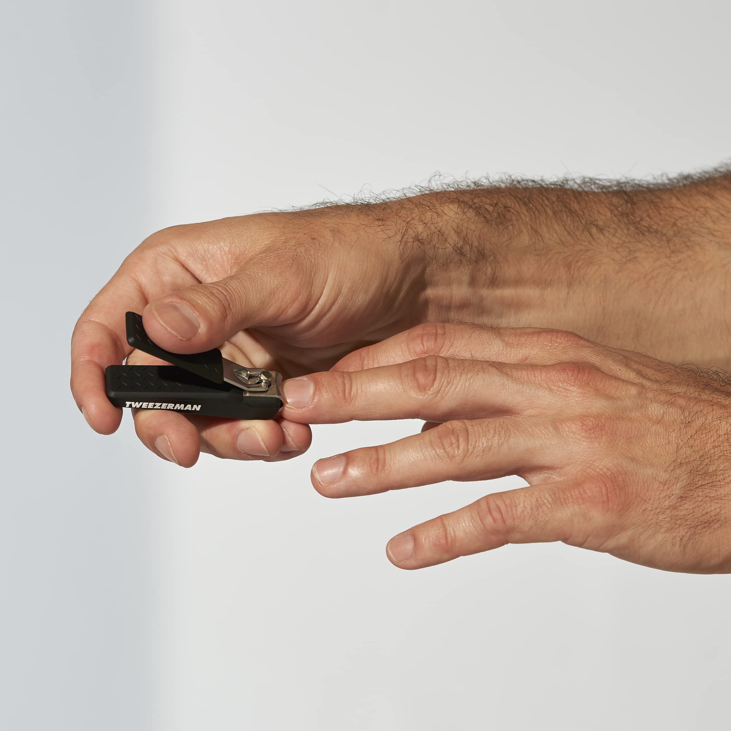 Tweezerman Precision Grip Fingernail Clipper in black highlights stainless steel durability.