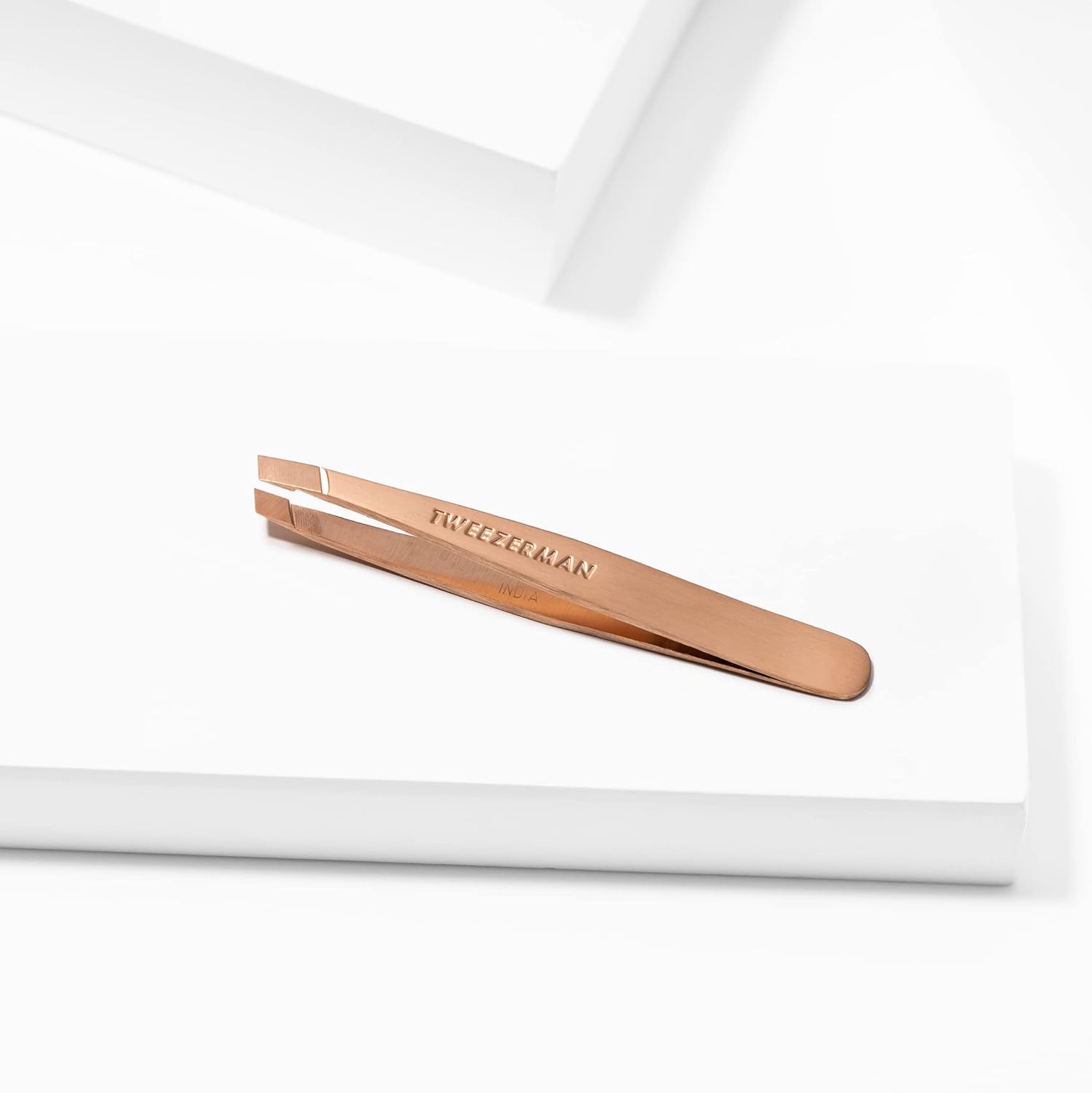 Tweezerman Rose Gold Mini Slant Tweezer brow shaping use supports clean, targeted hair removal.