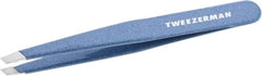 Tweezerman stainless steel slant tweezer with sky blue handle for precise brow shaping