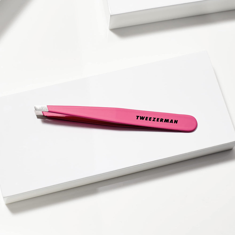 Tweezerman in-use brow shaping image highlights precise removal at the brow bone