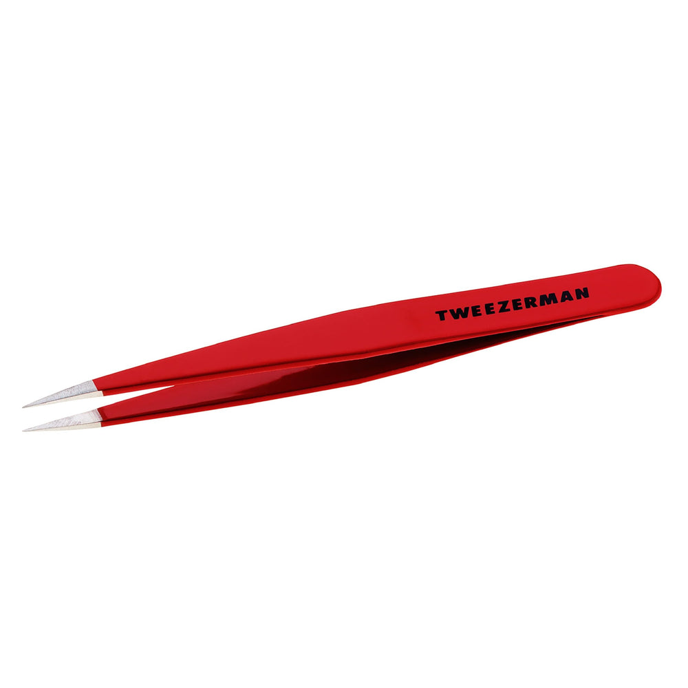 Tweezerman stainless steel point tweezer closeup for precise hair removal and brow shaping.