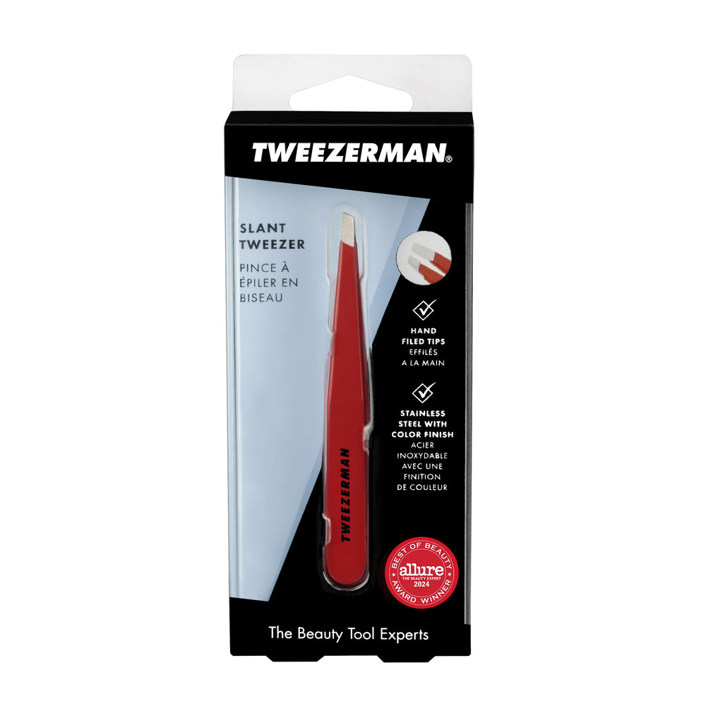Tweezerman slant tweezer being cleaned with alcohol wipe emphasizes hygiene and maintenance.