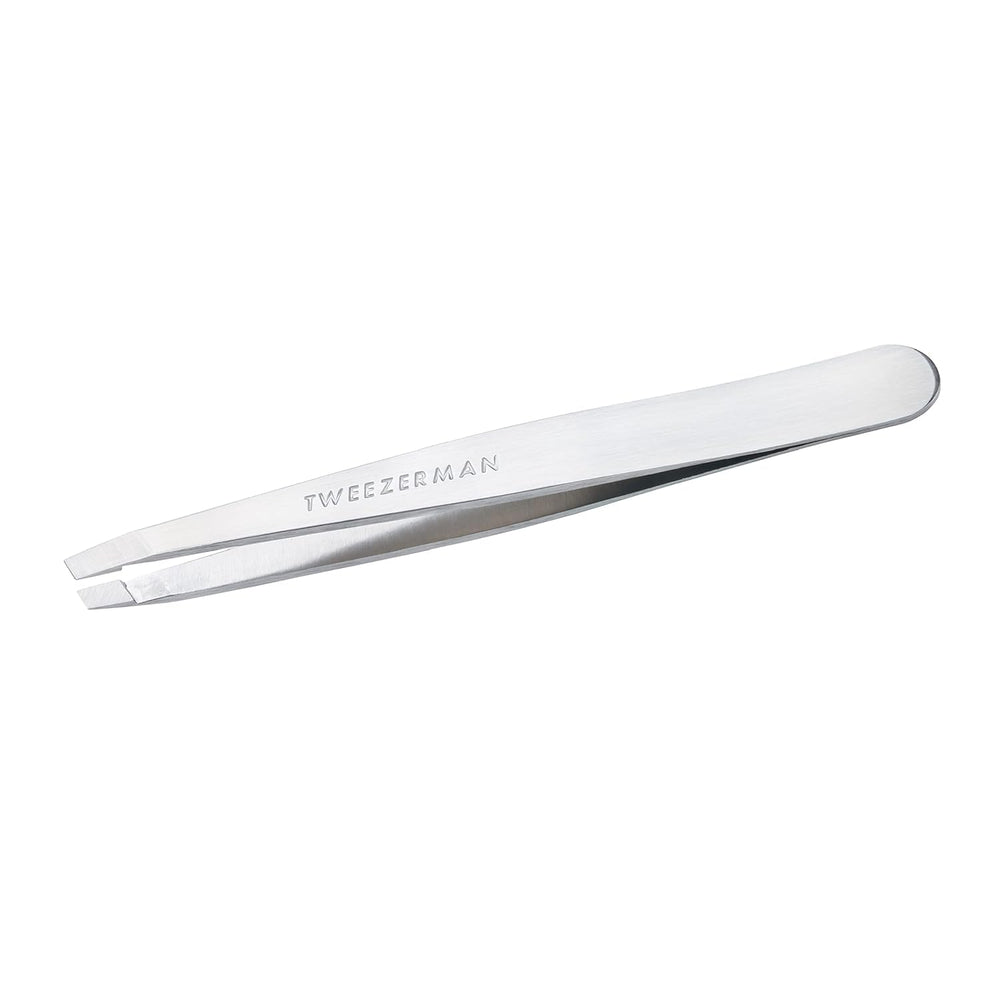 Tweezerman stainless steel slant tweezer angled for precise brow shaping.