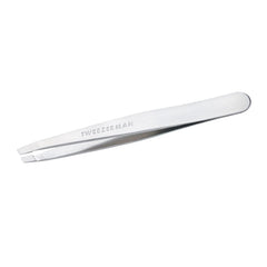 Tweezerman stainless steel slant tweezer angled for precise brow shaping.