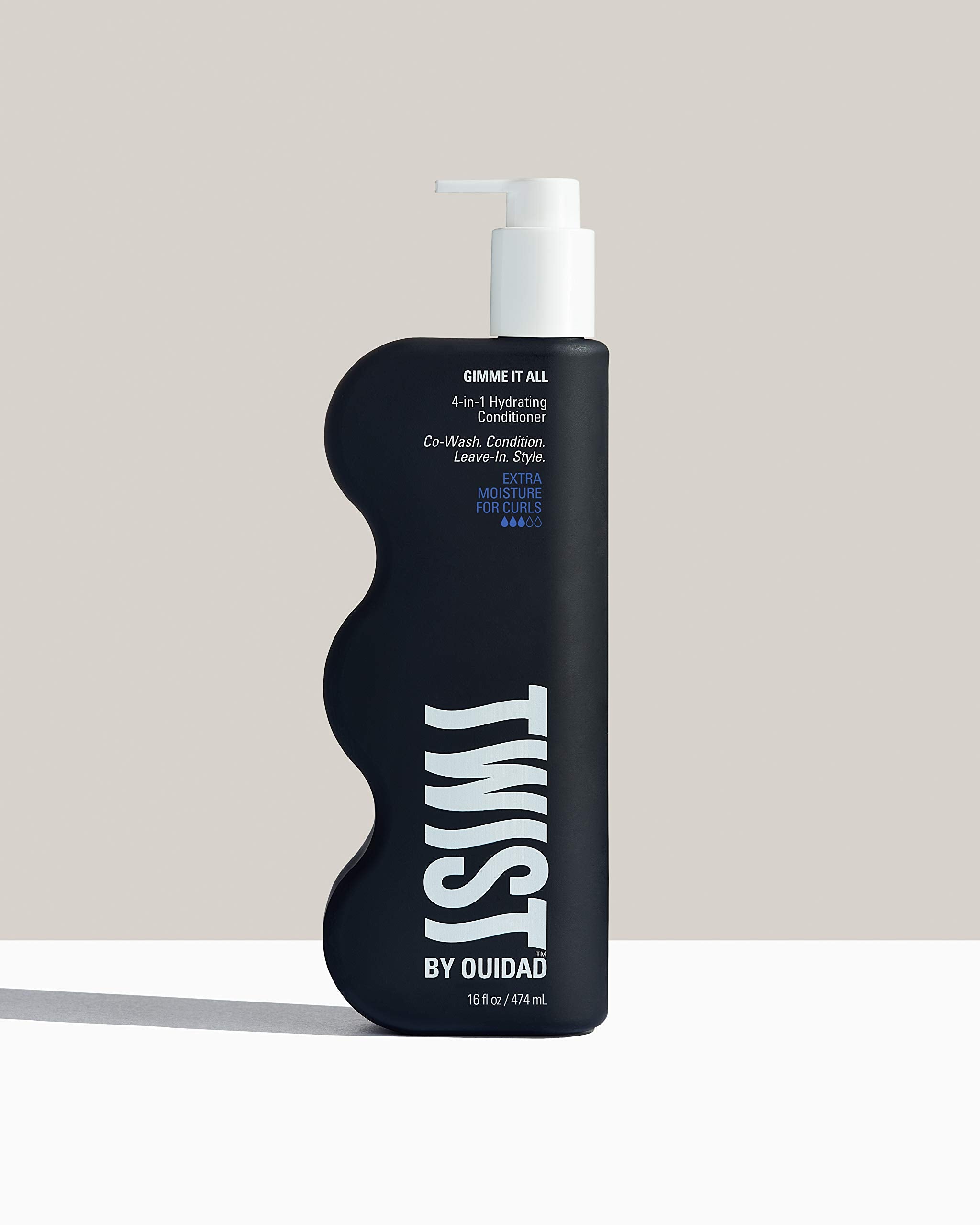 TWIST Gimme It All damage defense shot shows frizz prevention for treated curls.