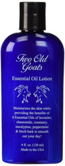 Two Old Goats Lotion bottle front highlighting moisturizing essential oil blend