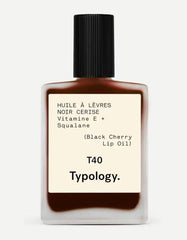 Typology Tinted Lip Oil in Black Cherry bottle delivers glossy, nourishing lip color.