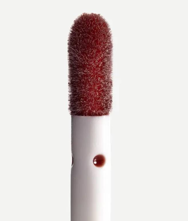 Typology Tinted Lip Oil swatch shows rich color with non-sticky shine.