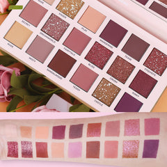 UCANBE pink cosmetic bag stores brushes and palettes neatly for on-the-go touch-ups