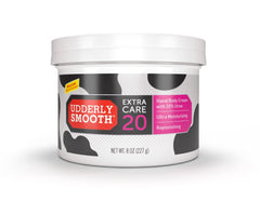 Udderly Smooth Extra Care 20% Urea bottle closeup shows rich, non-greasy hydration.