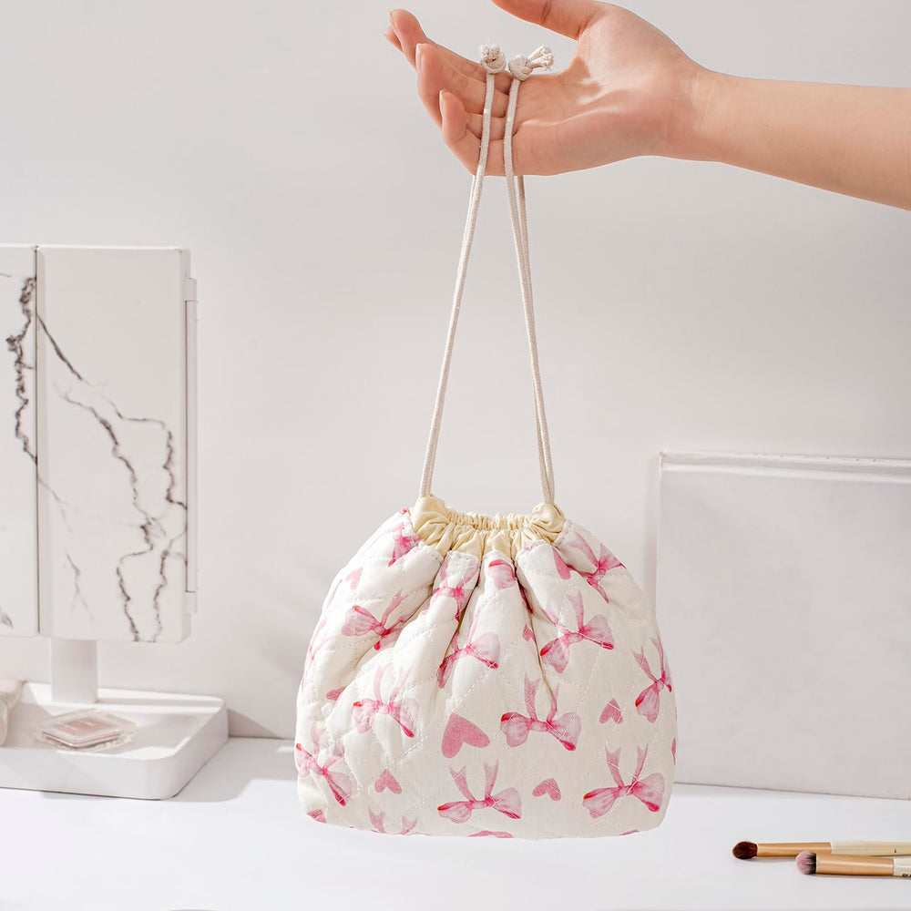 uekeboag coquette aesthetic makeup bag ready for travel and easy cosmetic organization.