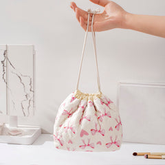 uekeboag coquette aesthetic makeup bag ready for travel and easy cosmetic organization.