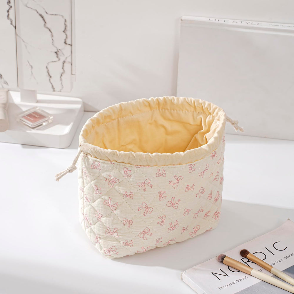 uekeboag cotton quilted drawstring makeup bag side profile is light and portable.
