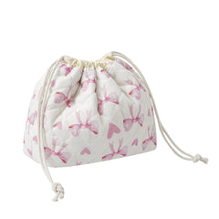 uekeboag cotton quilted makeup bag close-up shows soft fabric and floral stitching for daily cosmetics.