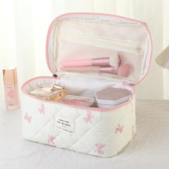 uekeboag floral pattern makeup bag interior layout shows easy access to essentials.