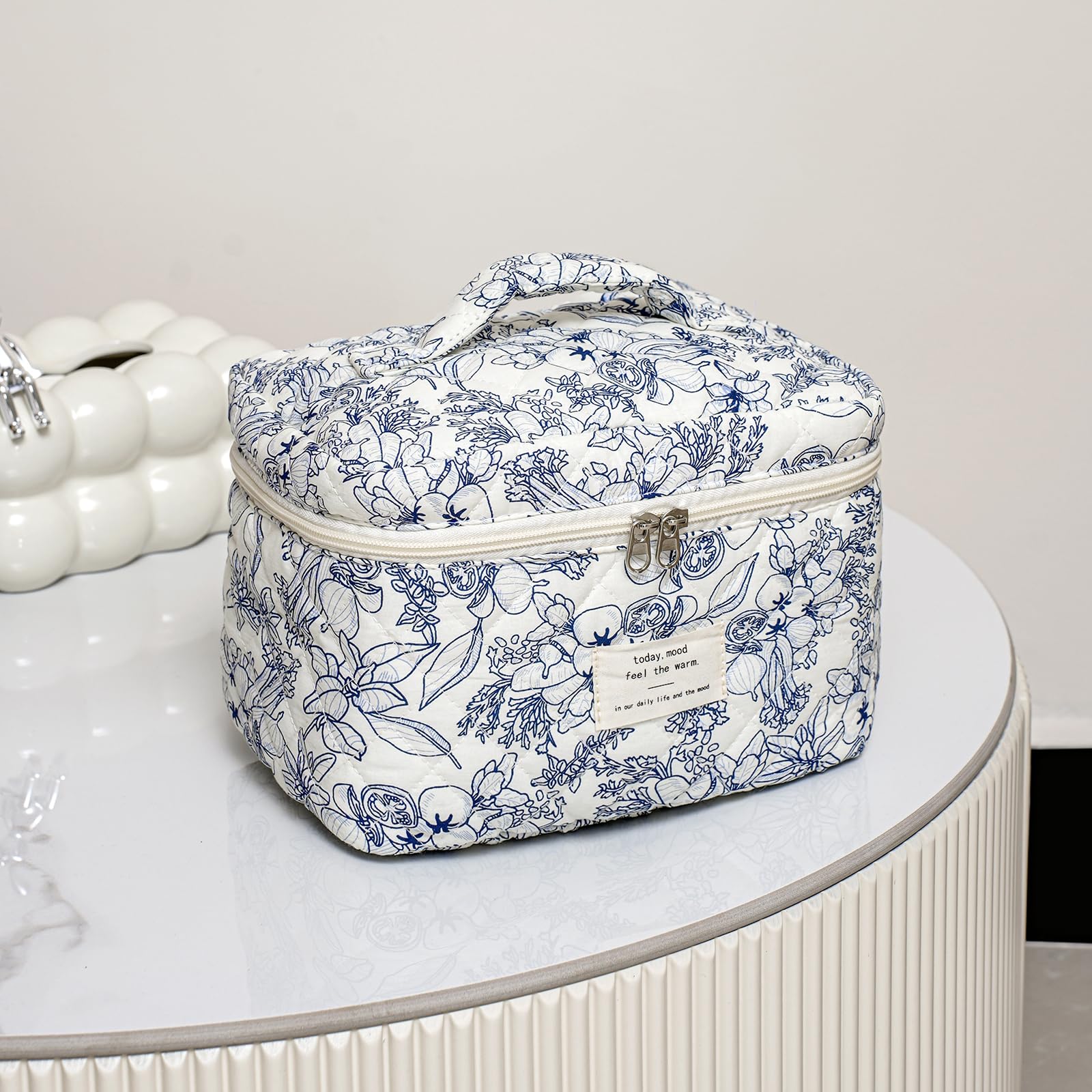 uekeboag makeup bag; zipped closure ensures secure storage during travel.