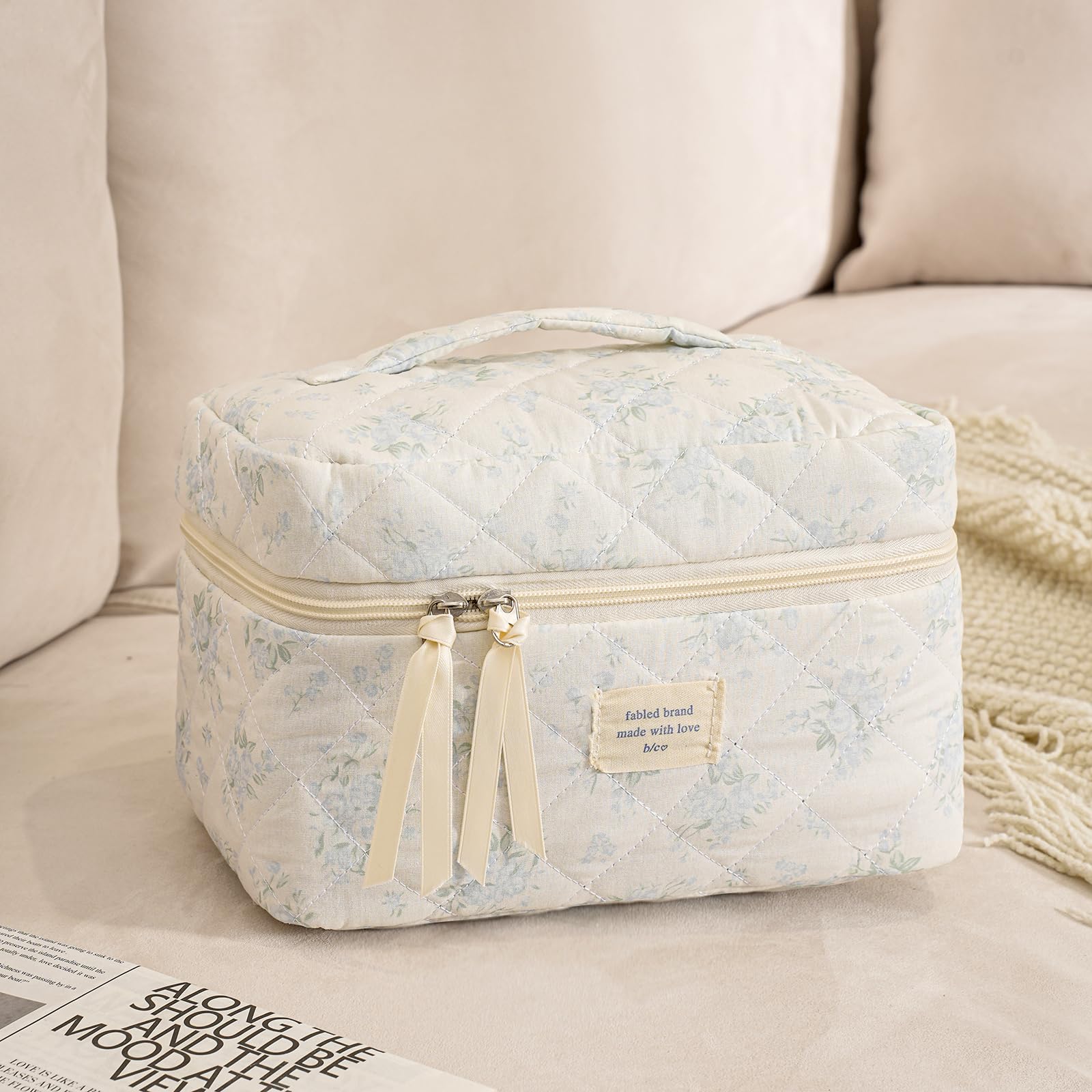 Uekeboag travel cosmetic bag interior with organized compartments for essentials.