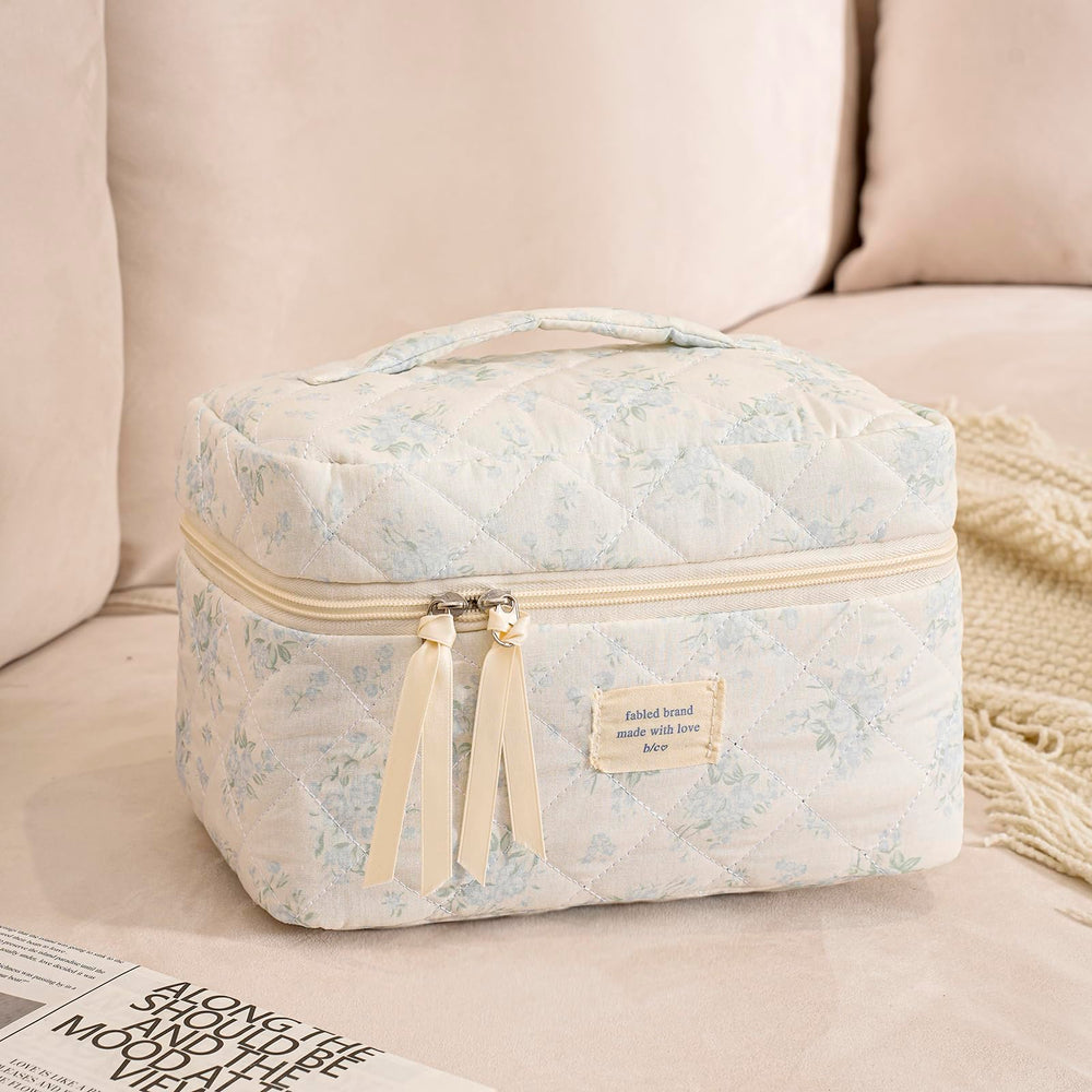 Uekeboag travel cosmetic bag interior with organized compartments for essentials.