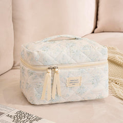 Uekeboag travel cosmetic bag interior with organized compartments for essentials.
