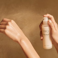 UIQ Biome Barrier Cream Mist spray application shown for even daytime hydration.