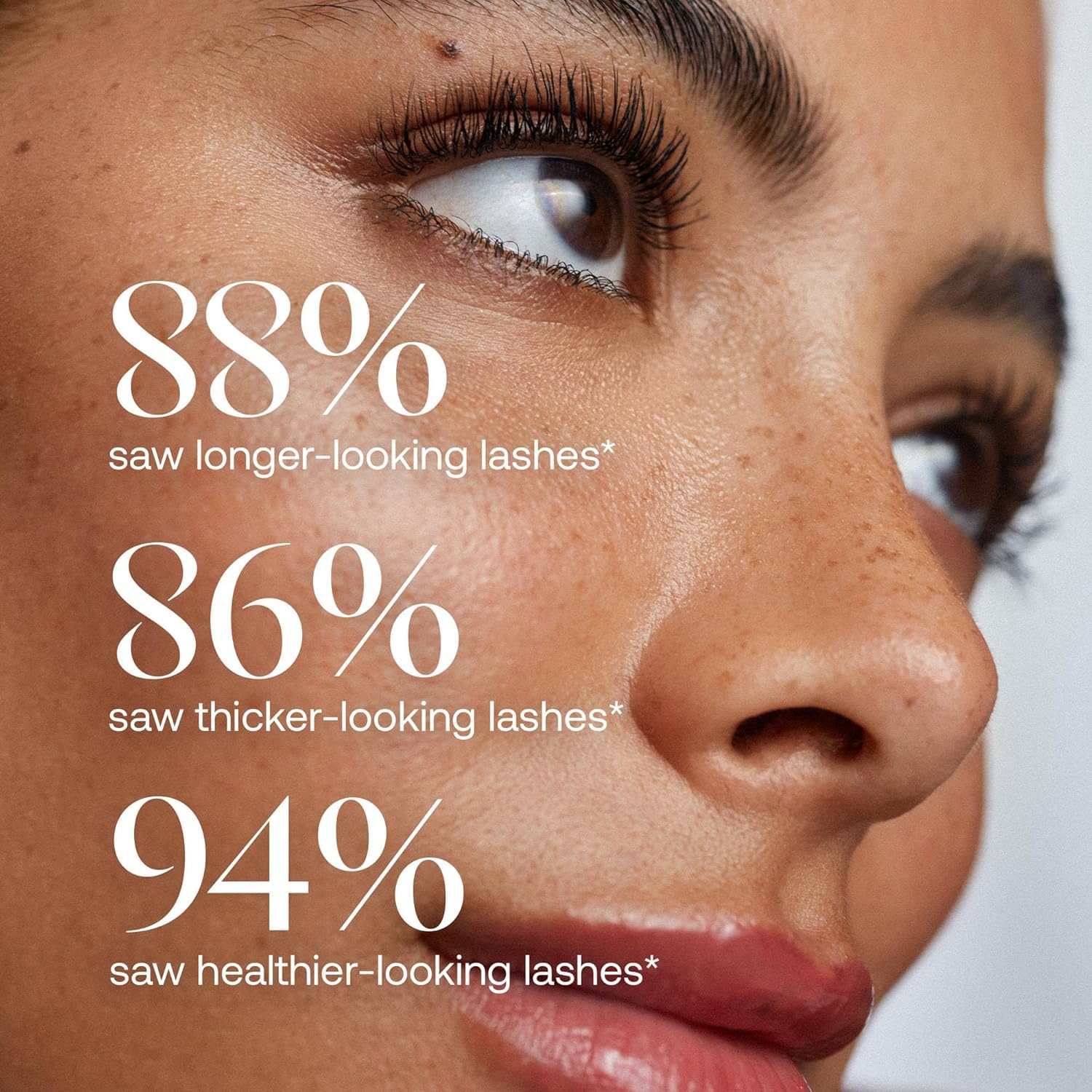 UKLASH precision applicator tip in hand, demonstrating accurate lash-line application