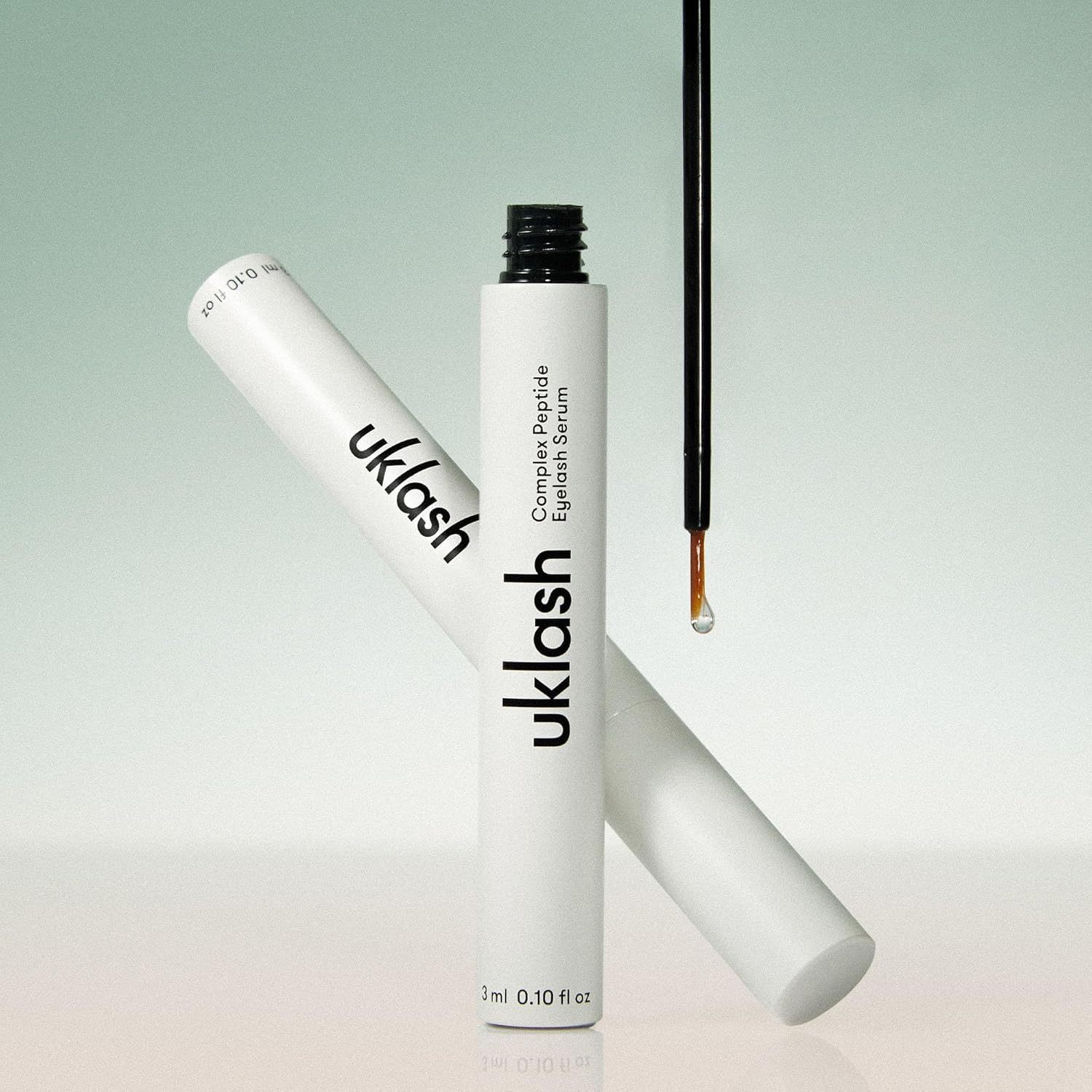 UKLASH bottle on bathroom shelf, illustrating easy nightly skincare routine