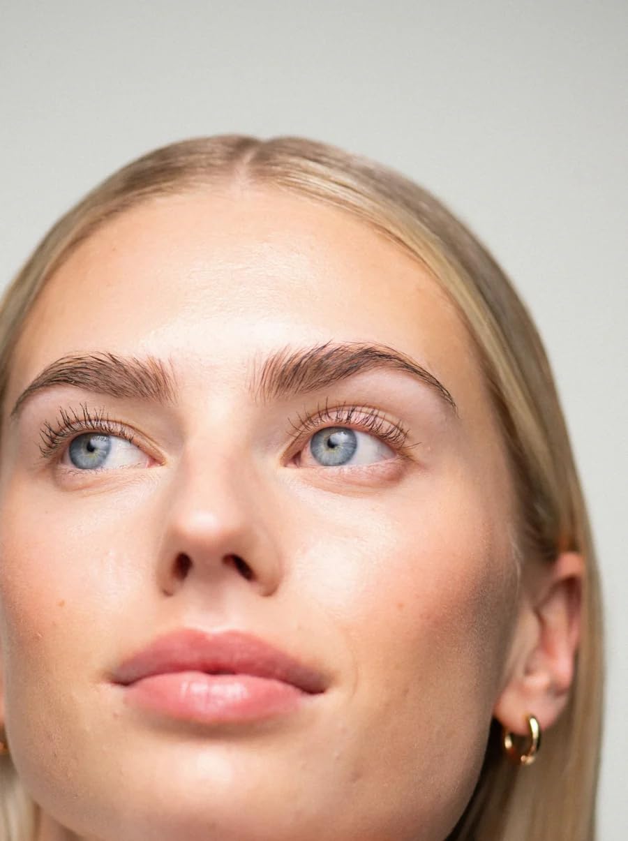 UKLASH mascara worn in lifestyle evening look showing long-lasting definition