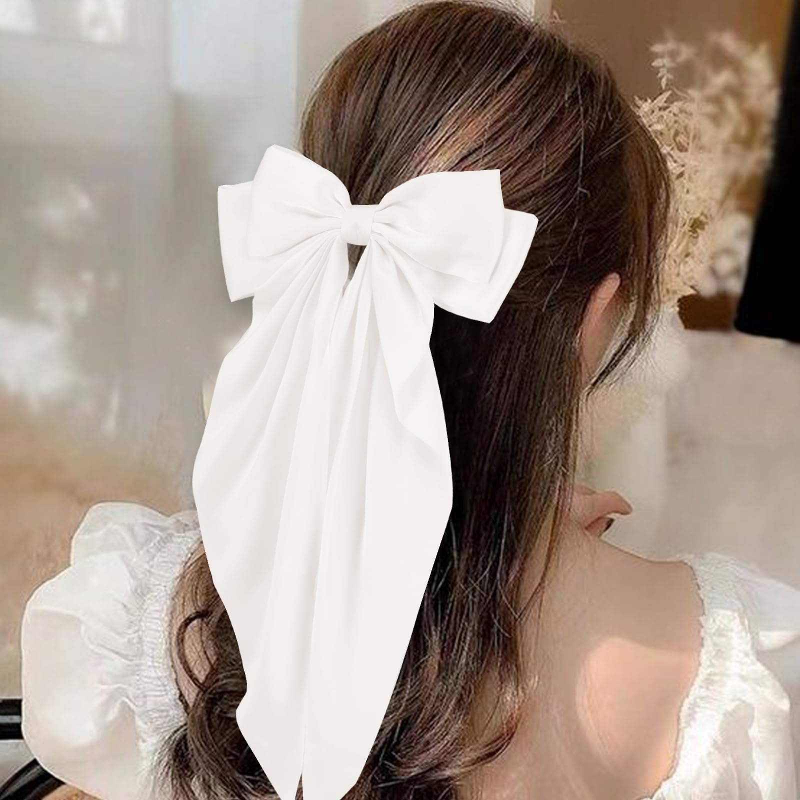 Unbednigt 14.96x7.88-inch large bows add volume.