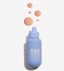 Undefined Beauty R&R Sun Serum Light Tint bottle ready for daily mineral SPF protection.