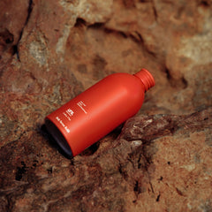 uni 24-hour hydrating body serum packaging made from recycled aluminum
