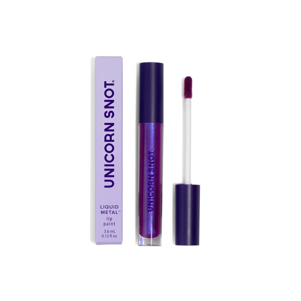 UNICORN SNOT Atomic Purple shade swatch conveys festive metallic glow.
