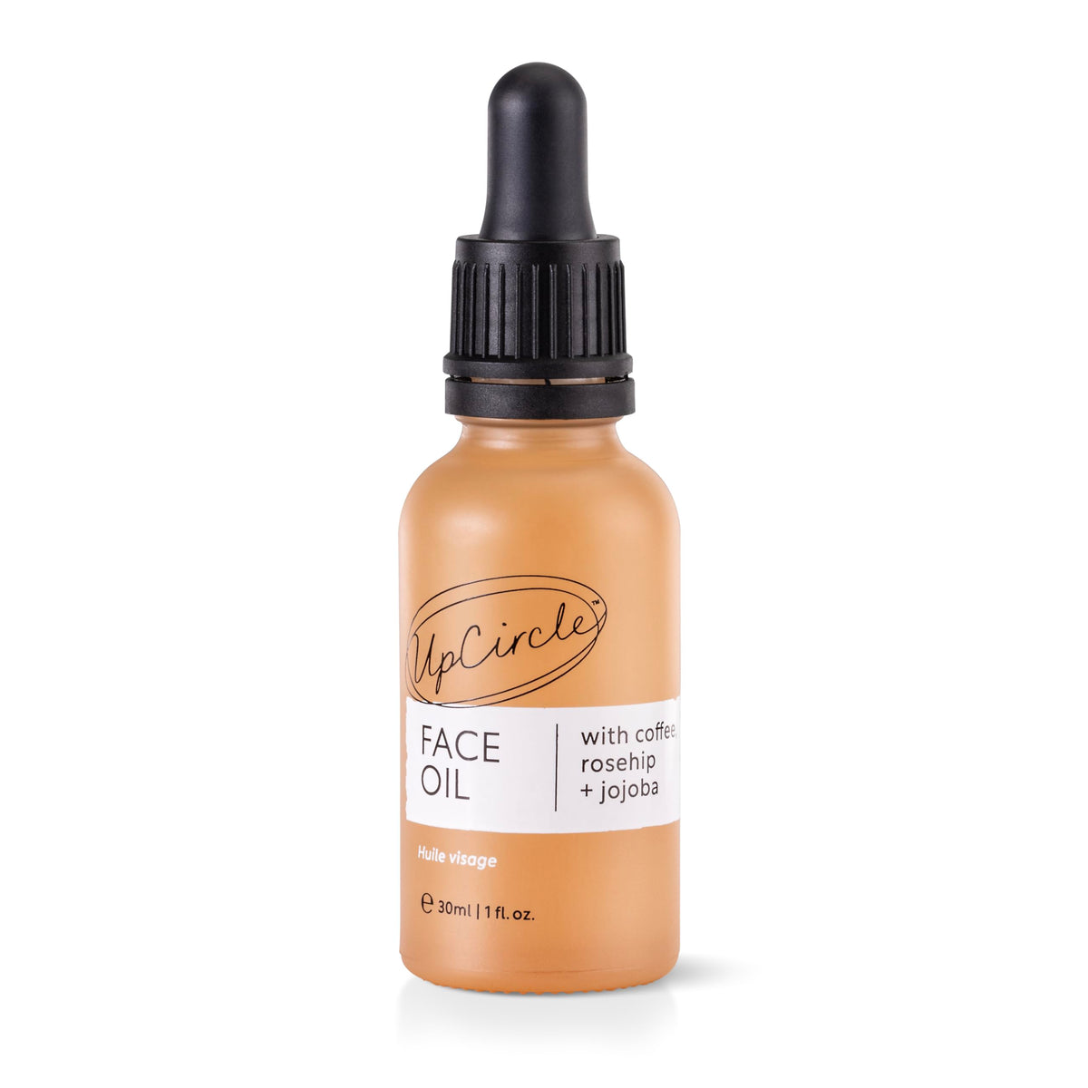 UpCircle coffee oil serum bottle close-up for hydrated skin