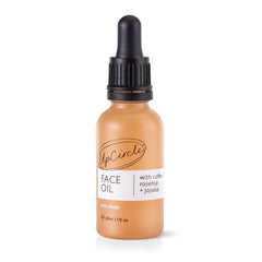 UpCircle coffee oil serum bottle close-up for hydrated skin
