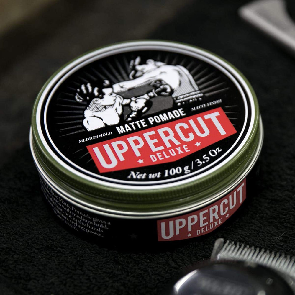 Uppercut Deluxe Matte Pomade styling short hair for a textured look