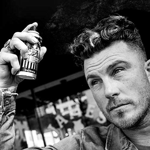 UPPERCUT DELUXE salt spray on wavy hair delivering beachy texture.
