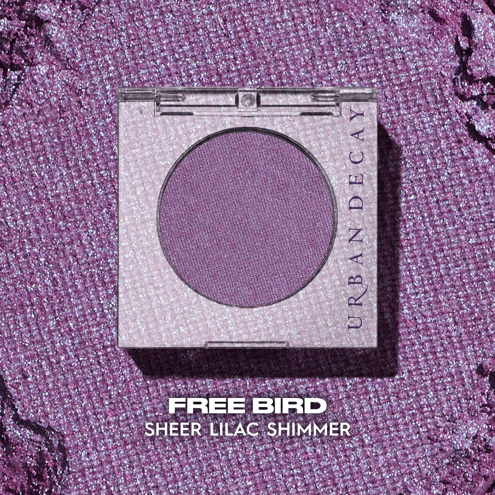 Urban Decay 24/7 Eyeshadow Single Freebird close-up highlights a fine lilac shimmer.