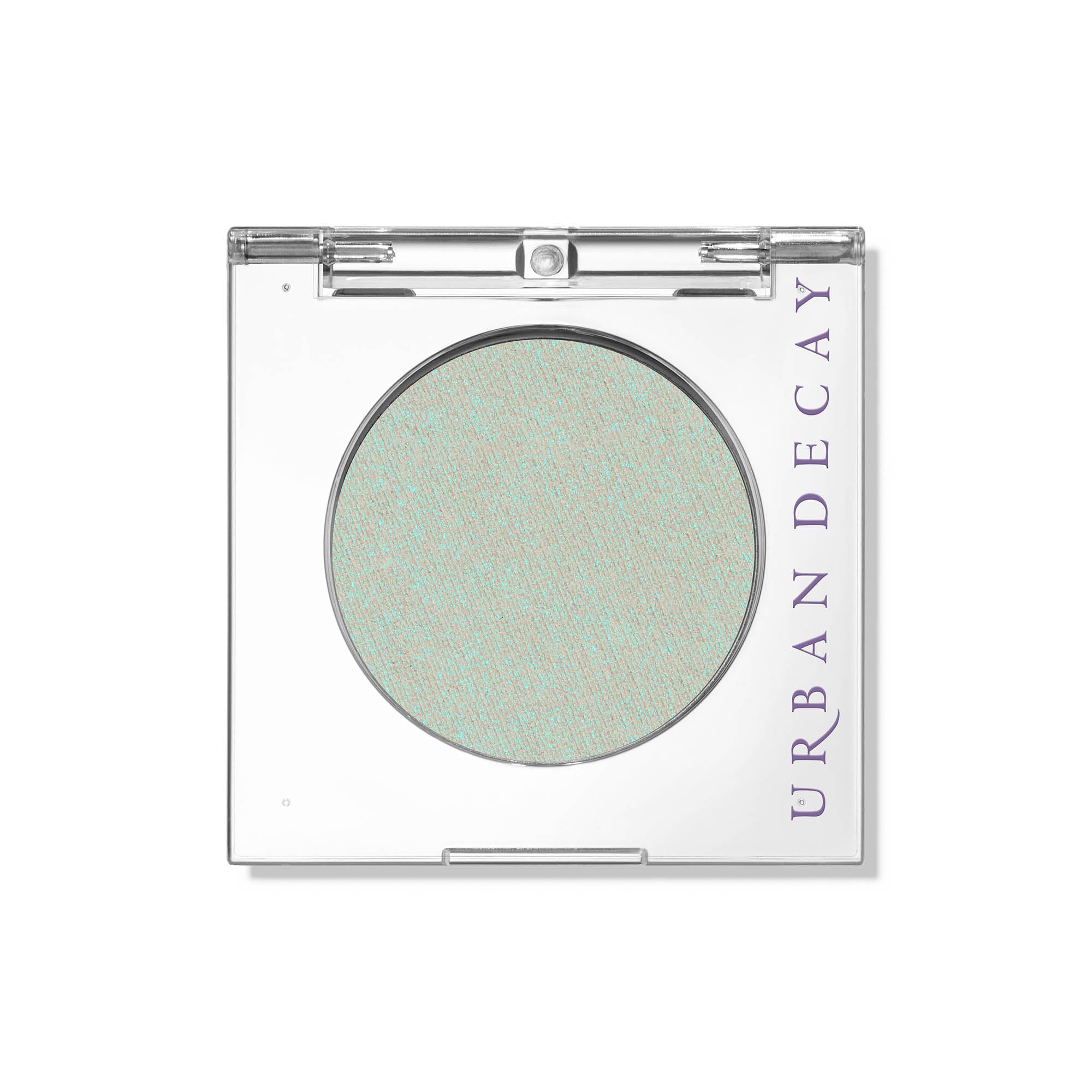 Urban Decay 24/7 Lucid teal eyeshadow close-up shows teal shimmer for an evening look.