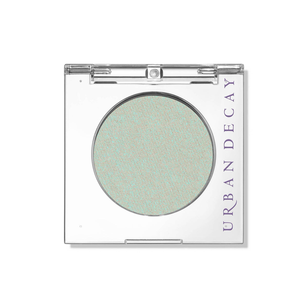Urban Decay 24/7 Lucid teal eyeshadow close-up shows teal shimmer for an evening look.