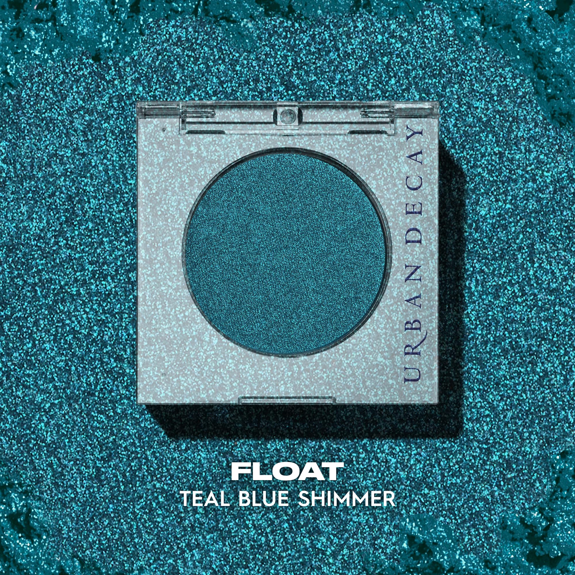 Urban Decay 24/7 Longwear Eyeshadow Single Float teal shimmer closeup highlights creamy, velvety texture.