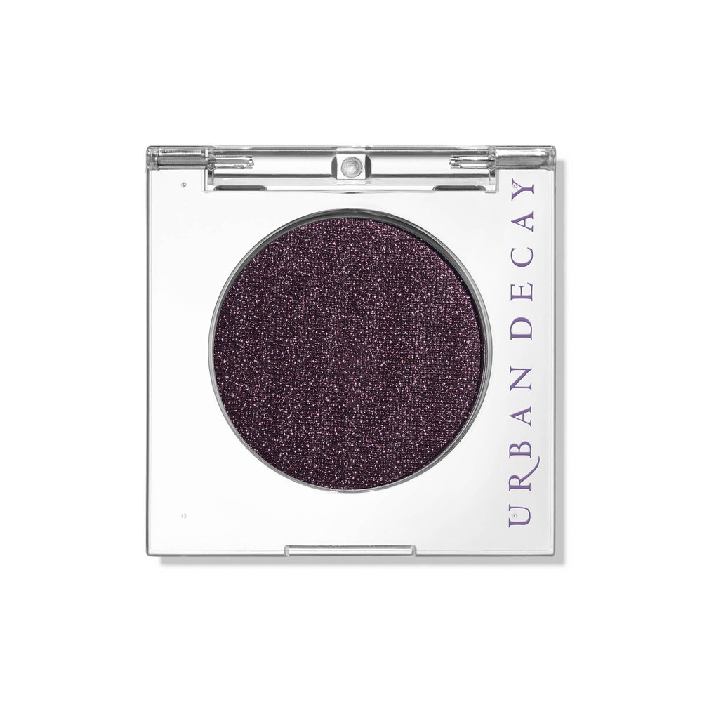 Urban Decay 24/7 Eyeshadow Ride: deep brown shimmer with purple shift for all-day color.