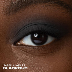 Urban Decay 24/7 Eyeshadow Single Blackout swatch on arm highlights rich pigment and even texture.