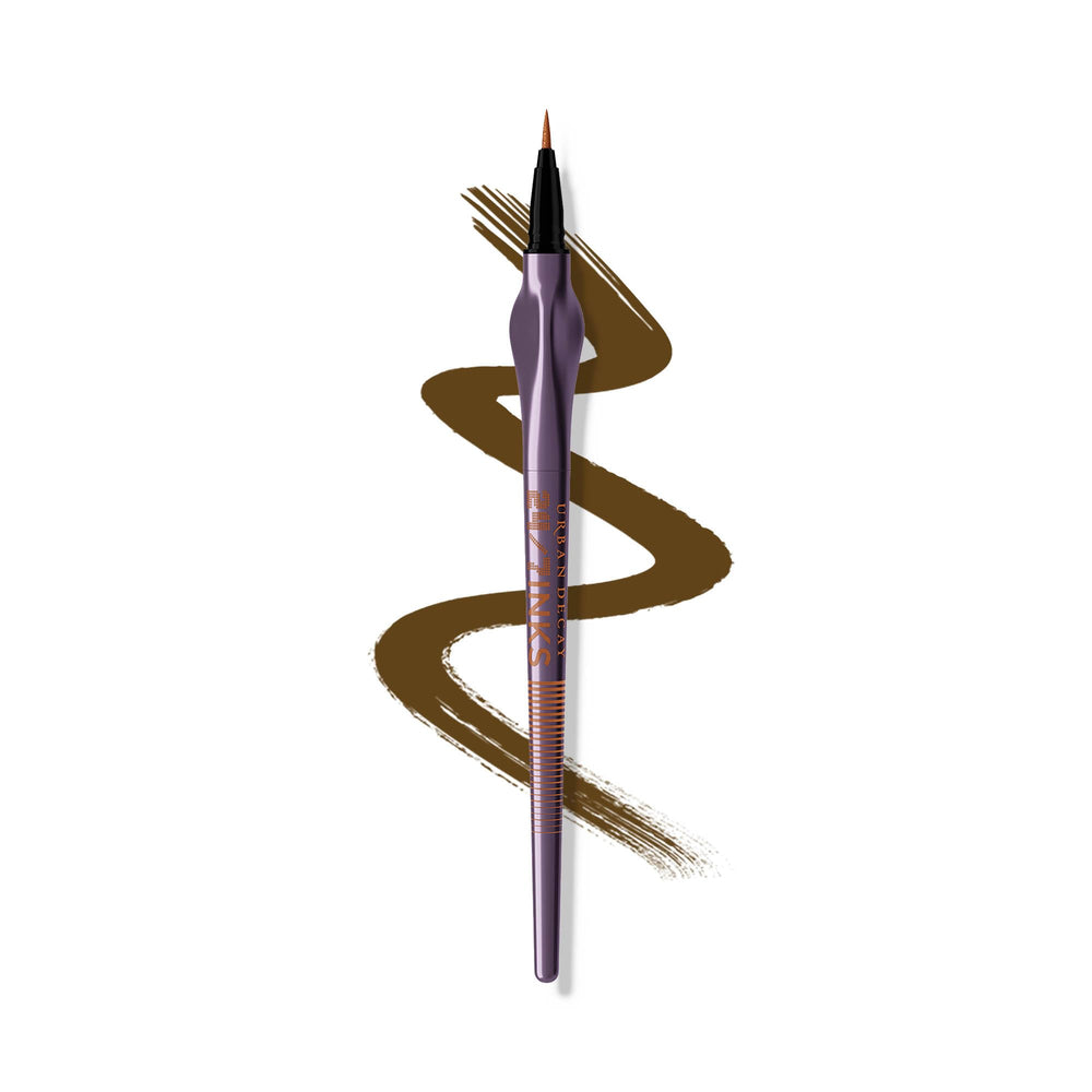 Urban Decay 24/7 Inks Whiskey swatch shows bold matte brown for defined eyes